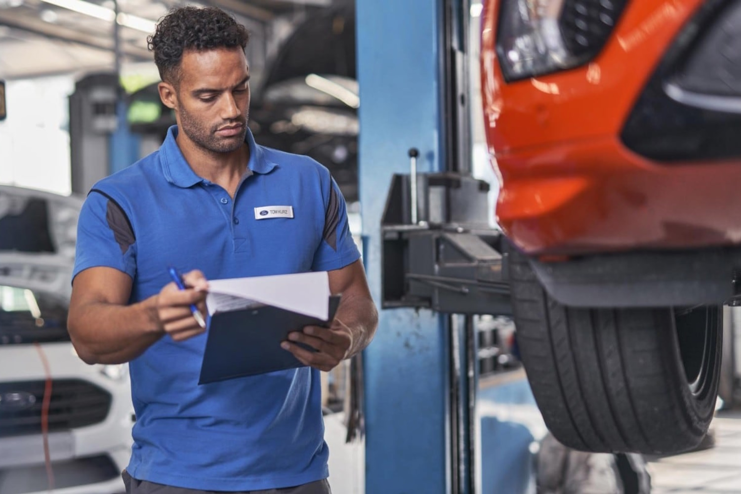 Mechanic monitoring a vehicle