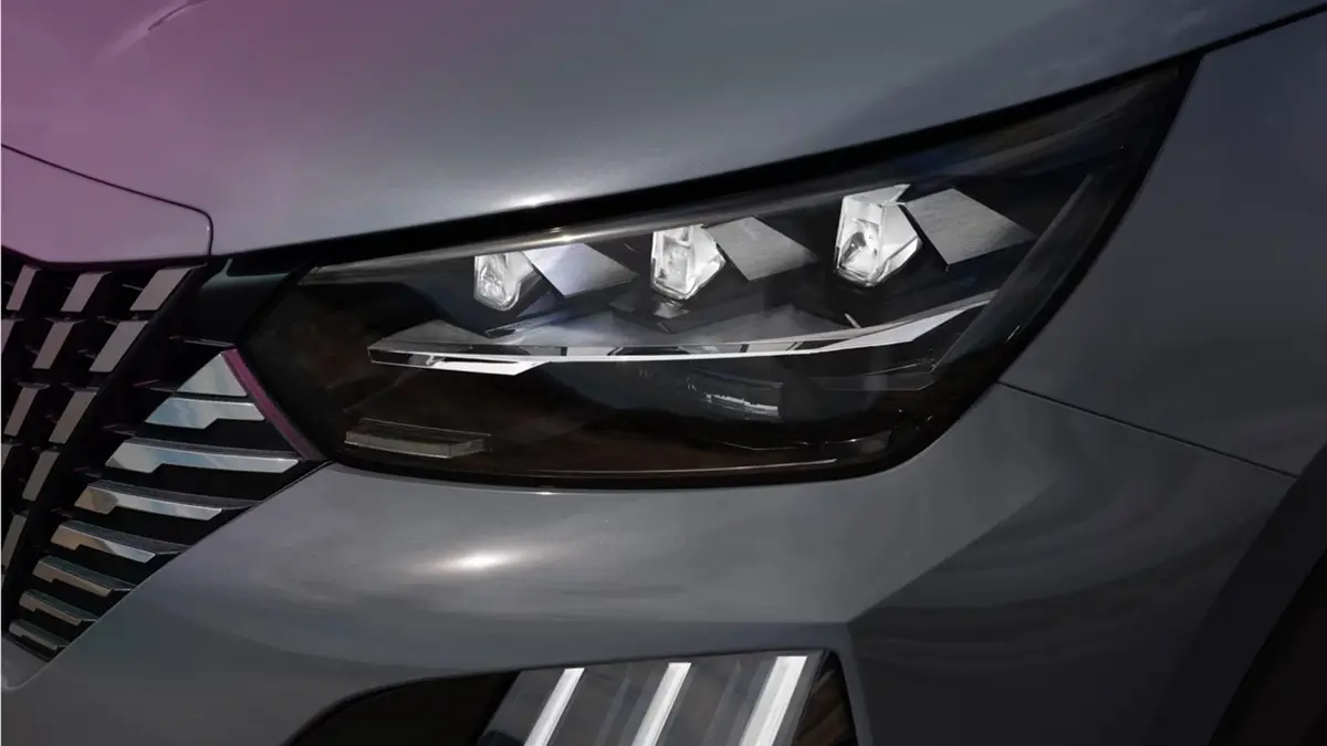 Close up of headlight of Grey Peugeot 2008