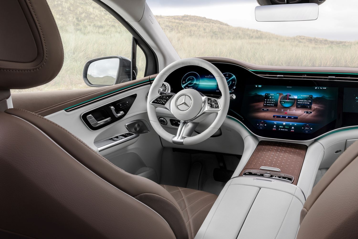 EQE SUV steering  white wheel and dual screen infotainment system.