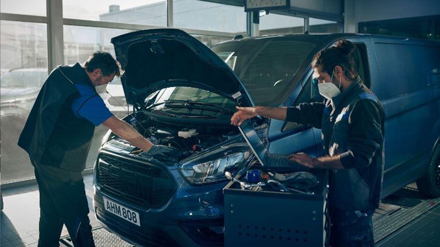 Ford technicians carrying out a commercial vehicle service
