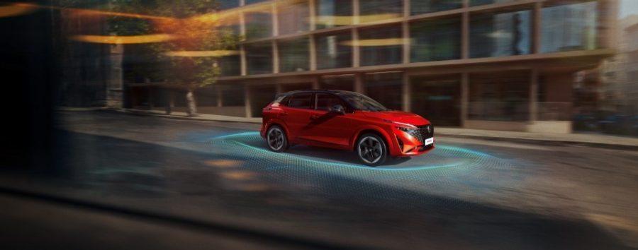 Nissan e-POWER vehicle driving calmly through urban traffic with smooth electric acceleration