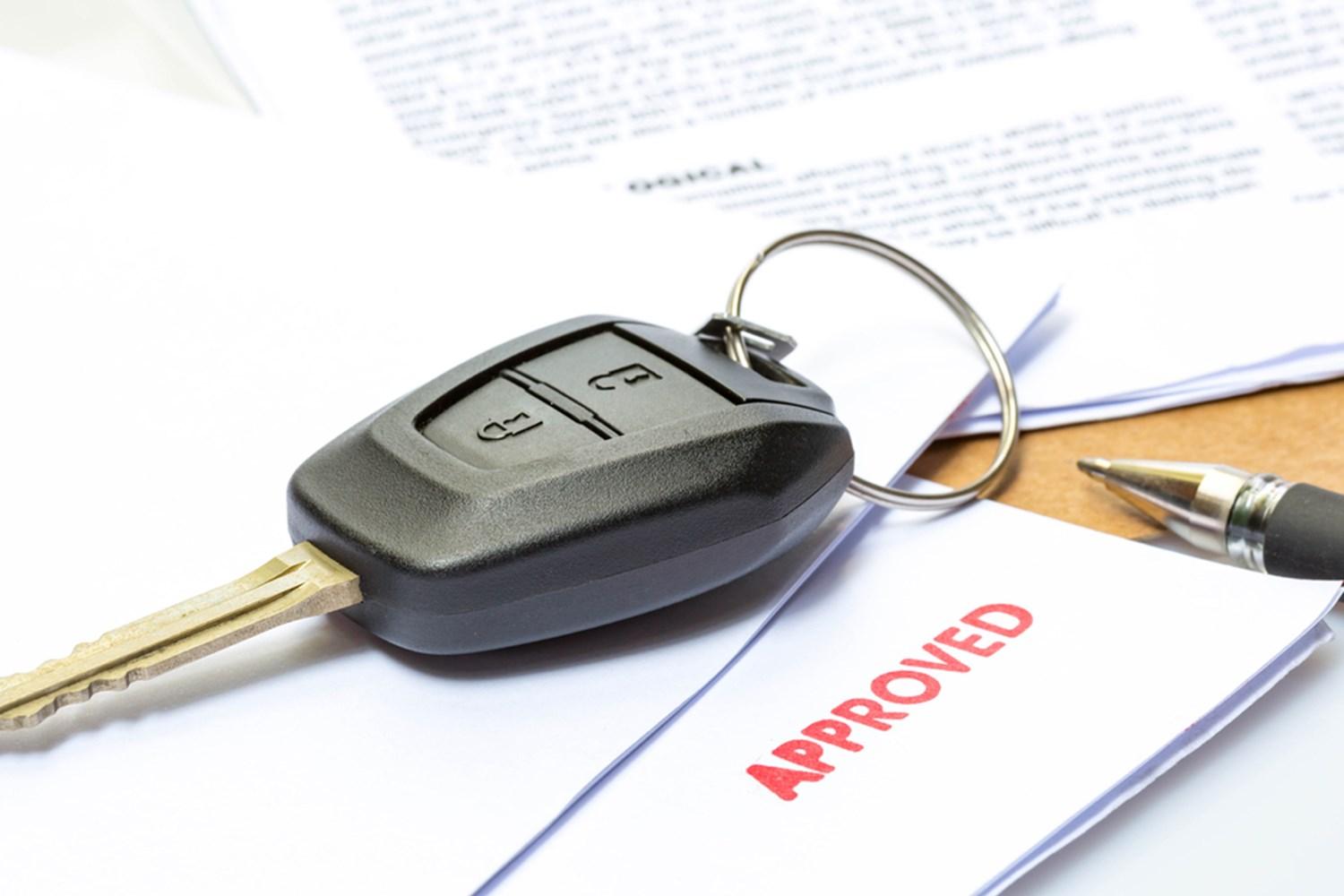 Car key on approved finance paperwork