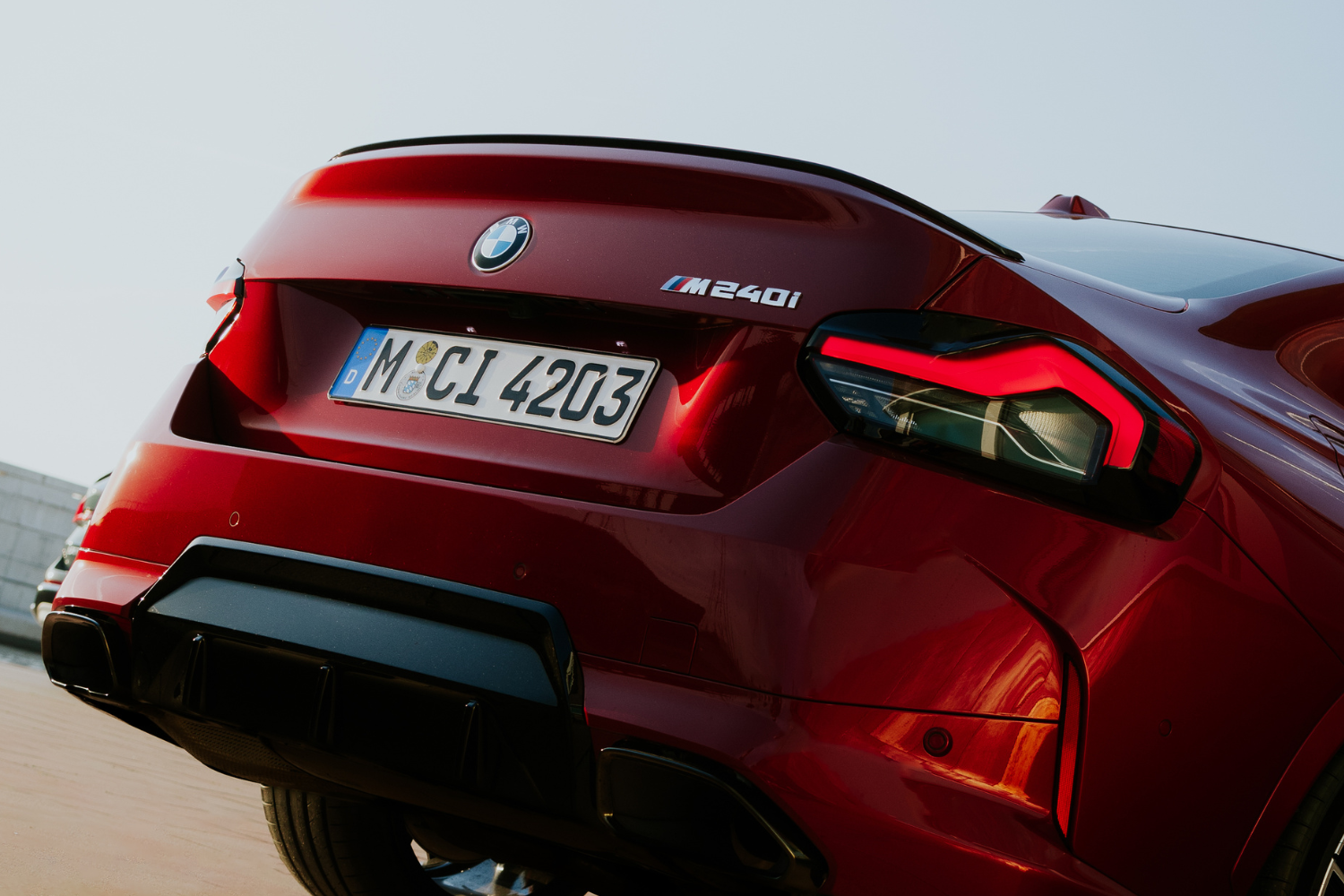 Close up of the rear end of the new BMW 2 Series Coupe in red.