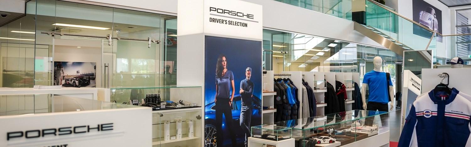 A selection of accessories and merchandise at the Porsche Boutique located in the showroom of Porsche Centre Belfast, Northern Ireland.