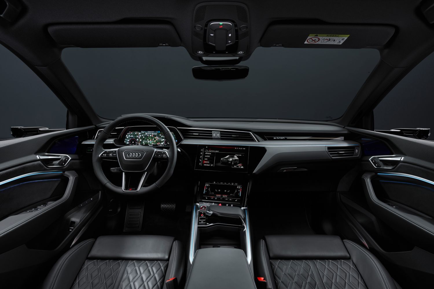 New Audi Q8 Sportback Etron image of front interior steering wheel and digital cockpit