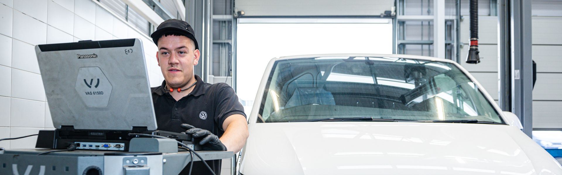 Volkswagen Commercial Vehicle Technician carrying out an initial diagnostic scan