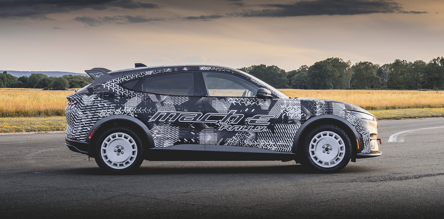 Black Mach-E Rally covered in white decals