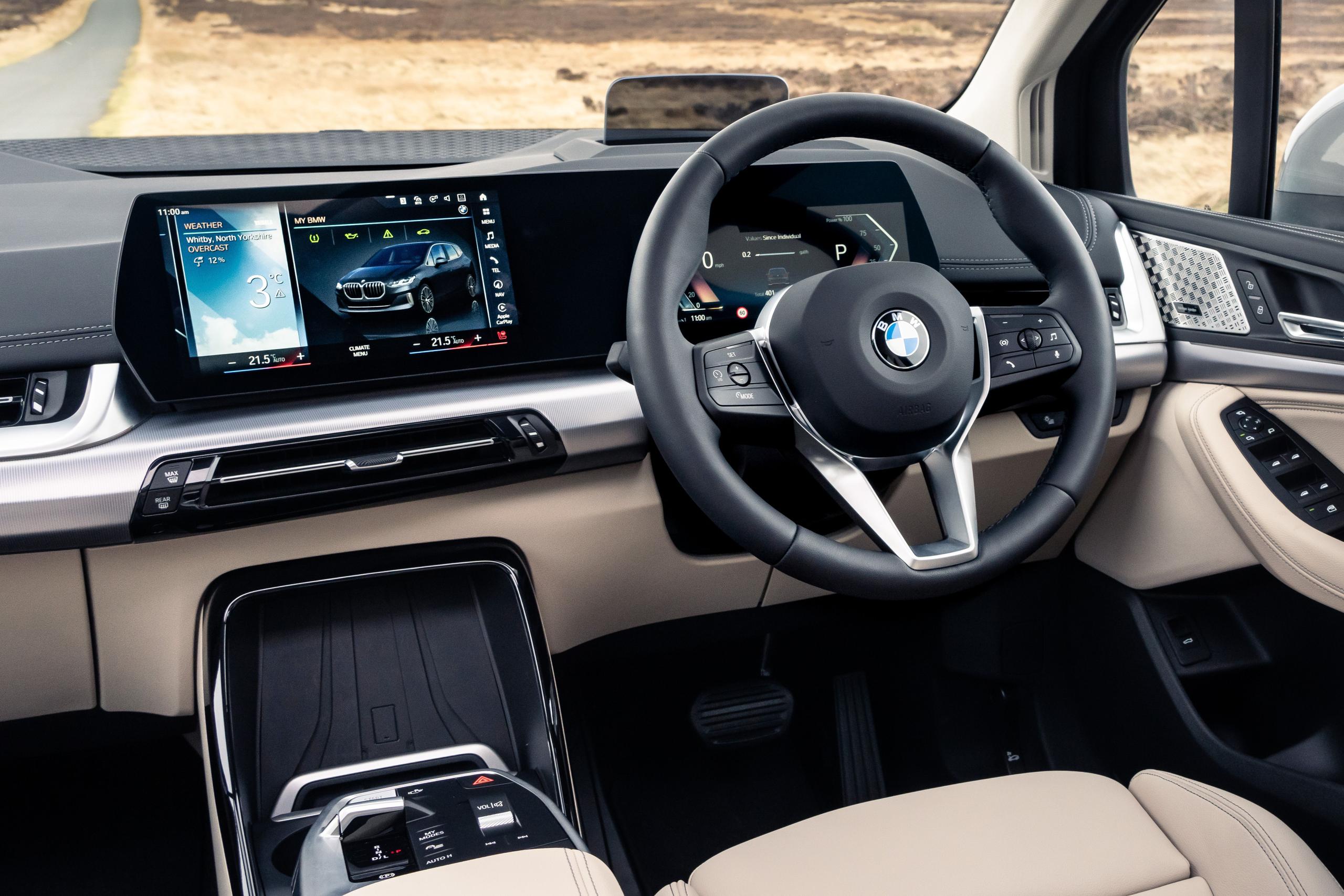 BMW 2 Series Active Tourer image of the front drivers seat, infotainment system and digital cockpit