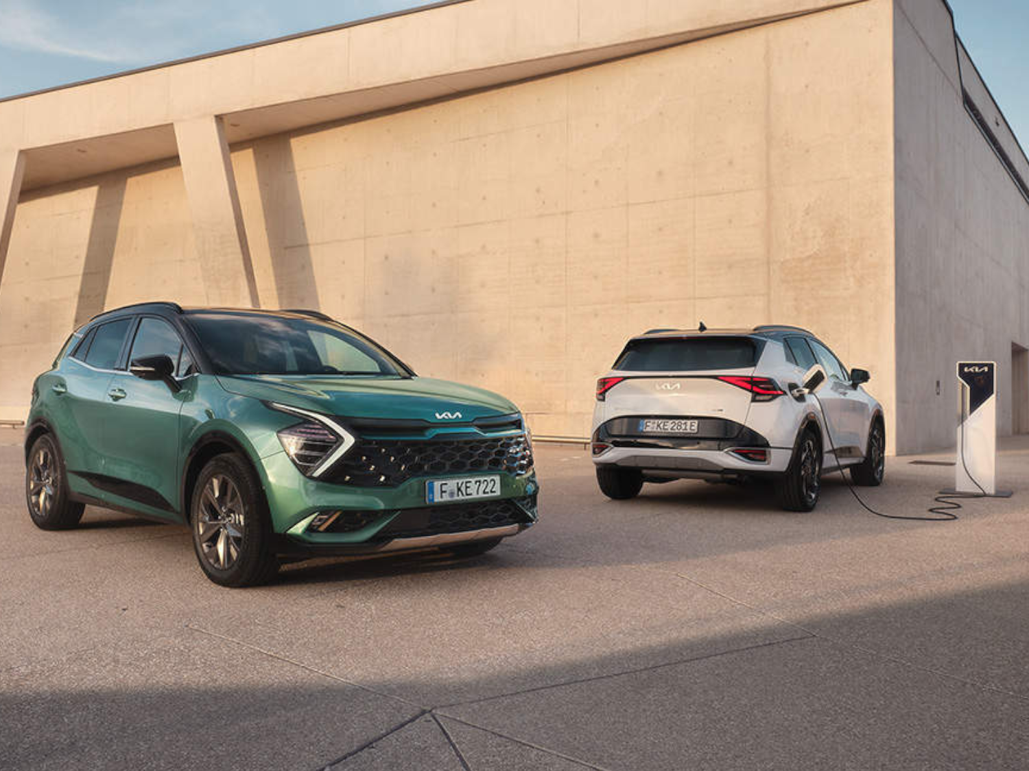 Green and white Kia Sportage