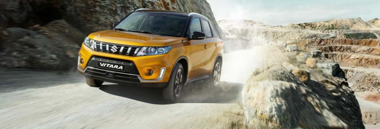 Suzuki Vitara driving outdoors