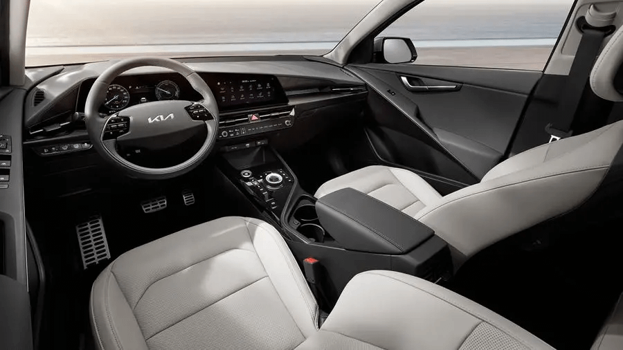 All-new Kia Niro interior, cream seats, black steering wheel and infotainment system