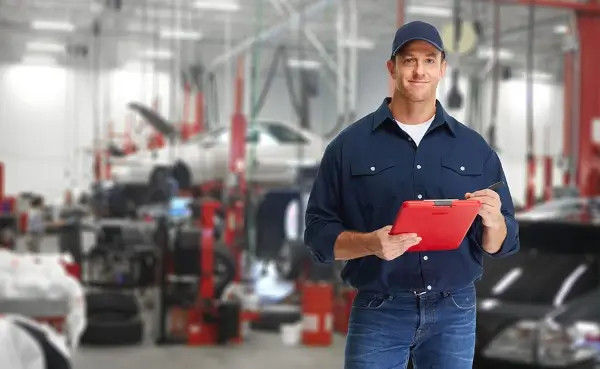 mechanic with a red clipboard