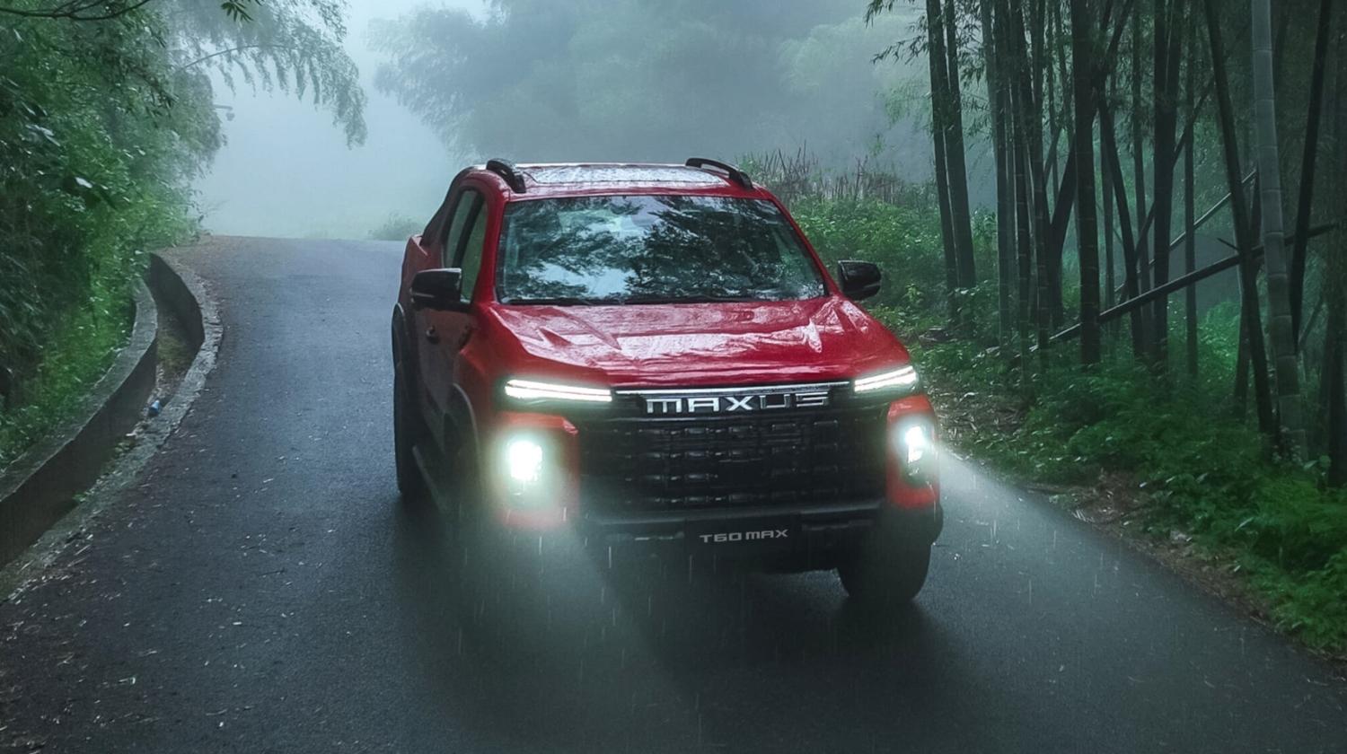 red T60 MAX driving in a forest road