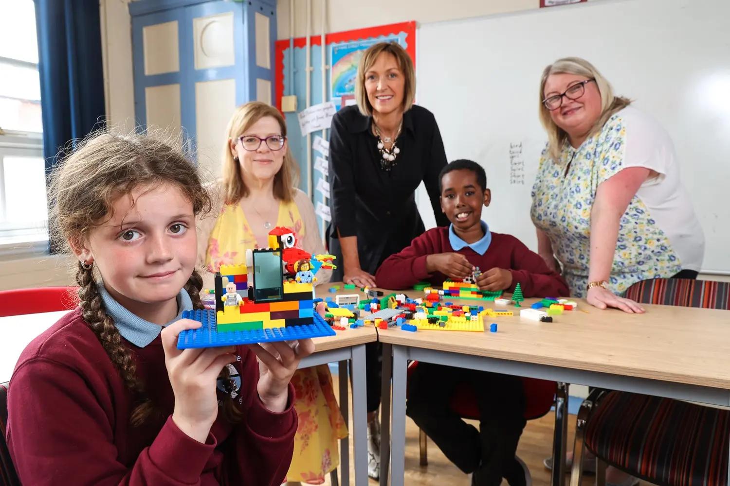 Agnew Group Mindwise Partnership, here some of the team are pictured in a classroom with staff.