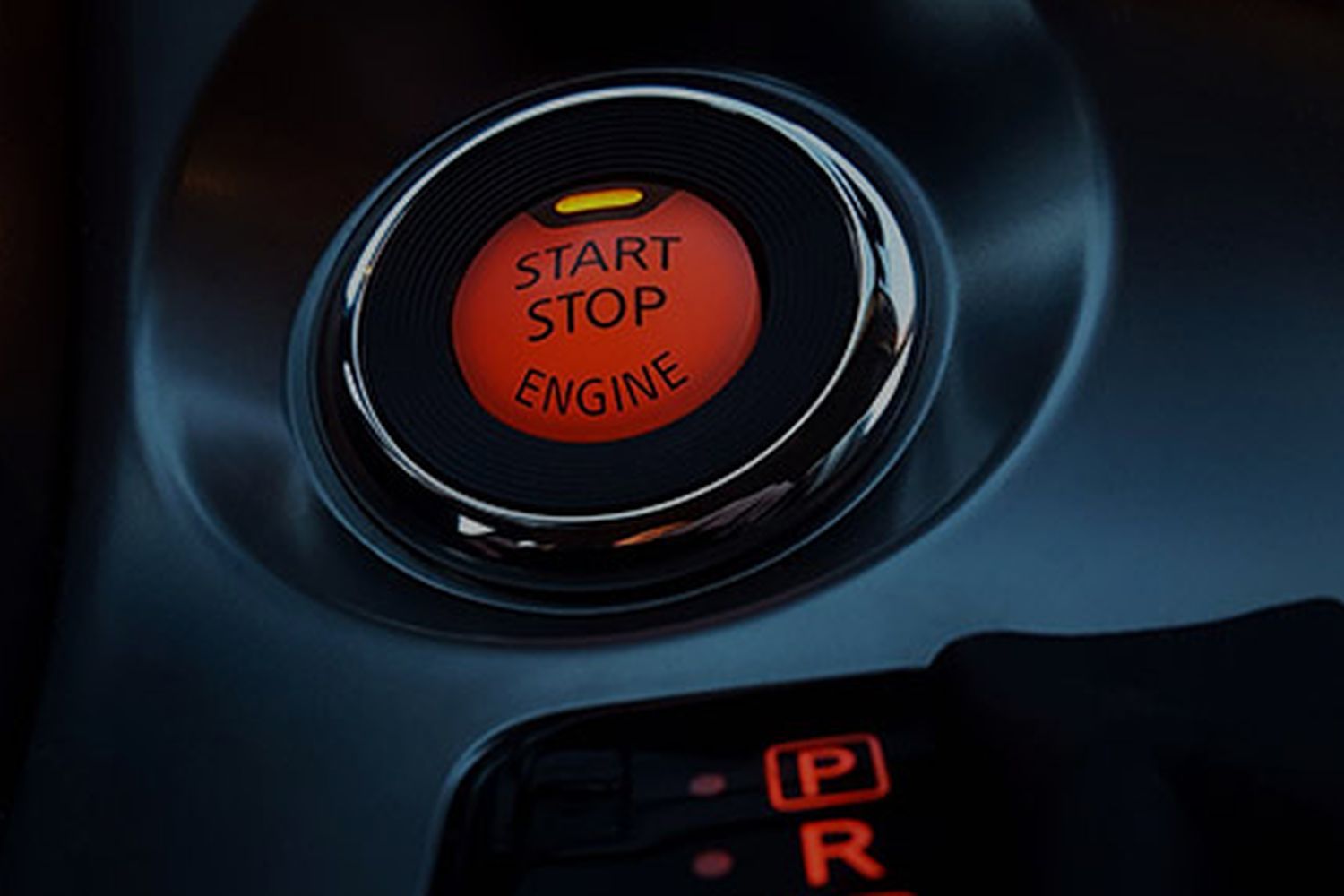 Close-up of Audi start stop engine button