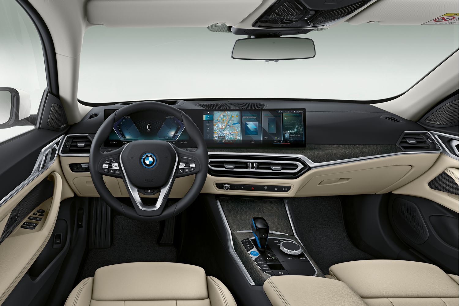 New BMW I4 front interior view of digital cockpit and infotainment system