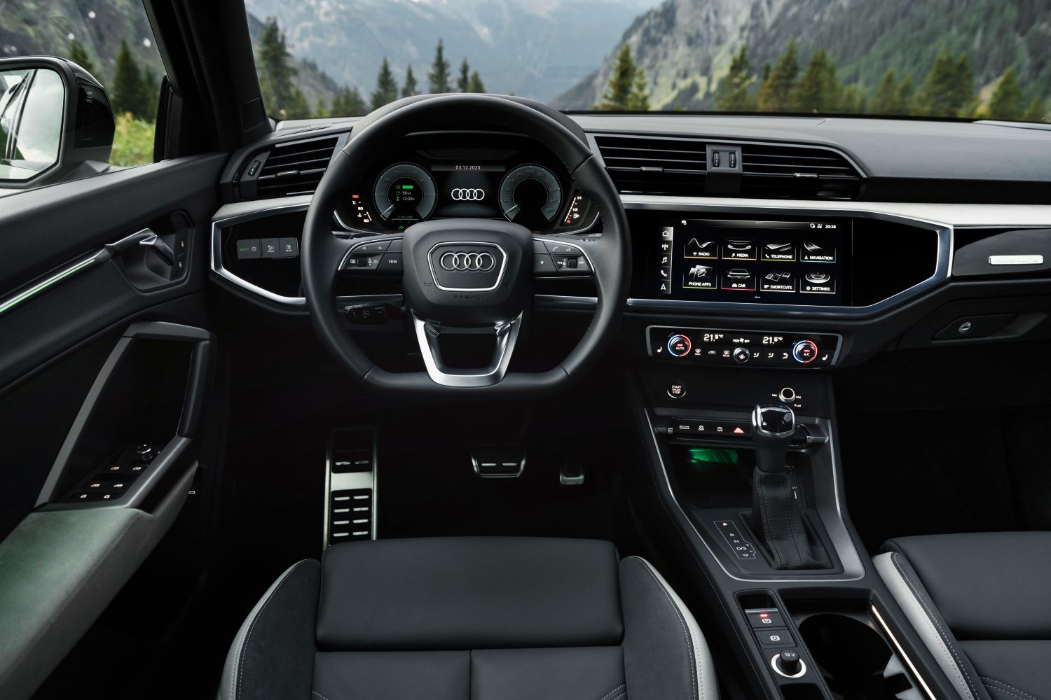 New Audi Q3 Sportback TFSI e drivers seat view of digital cockpit and infotainment system