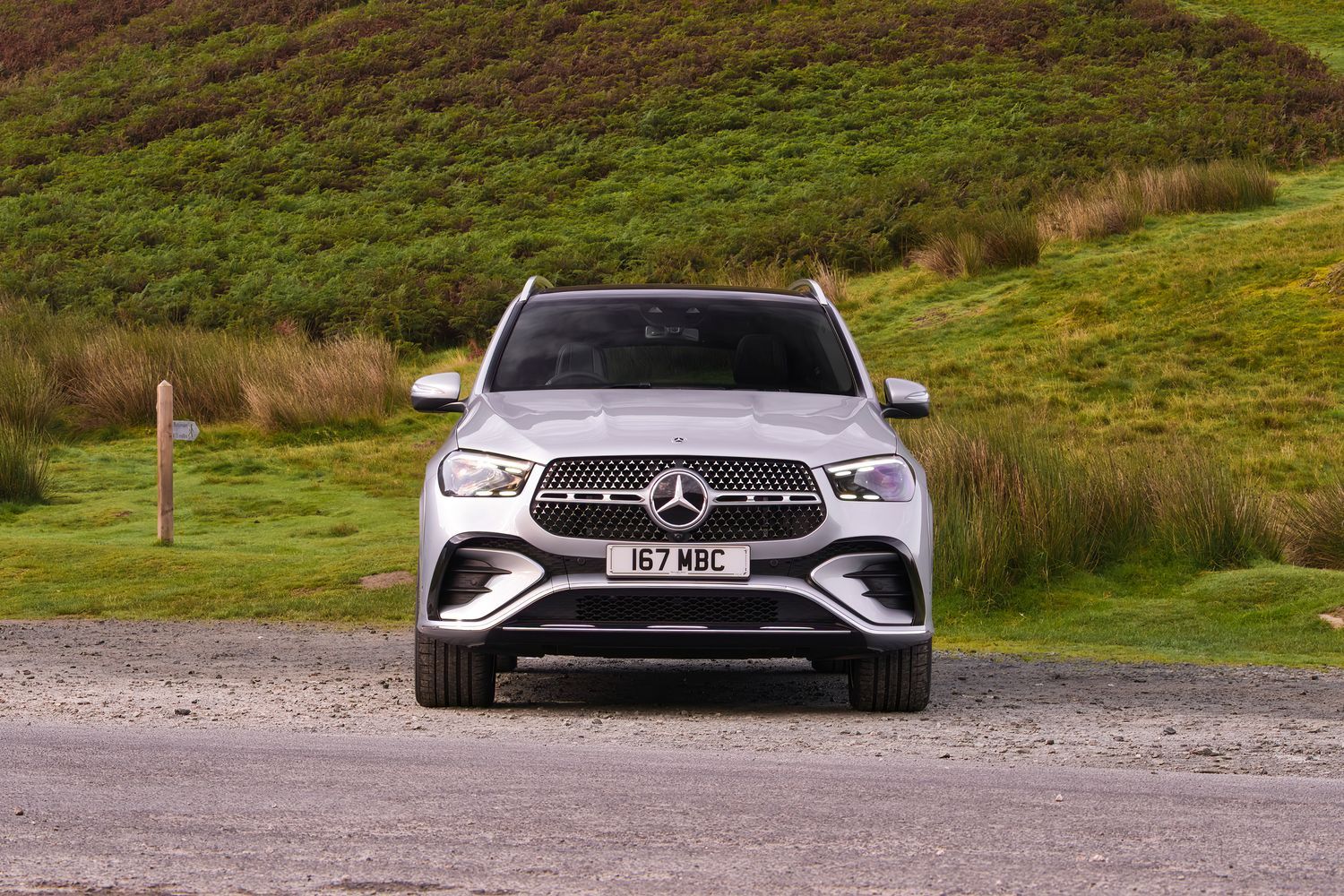 Front view of a silver Mercedes-Benz GLE featuring a newly designed radiator grille and air outlets.