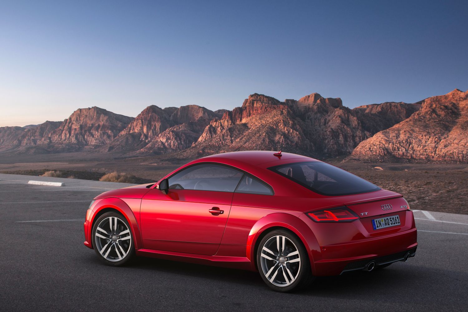 New Audi TT Coupe image of vehicle parked from the side view