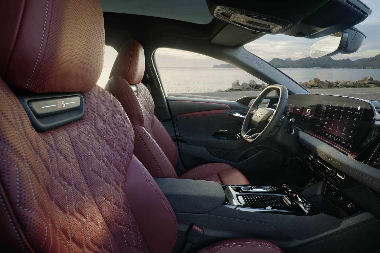 View from the passenger side of the new Audi S6 Avant e-tron red leather interior.