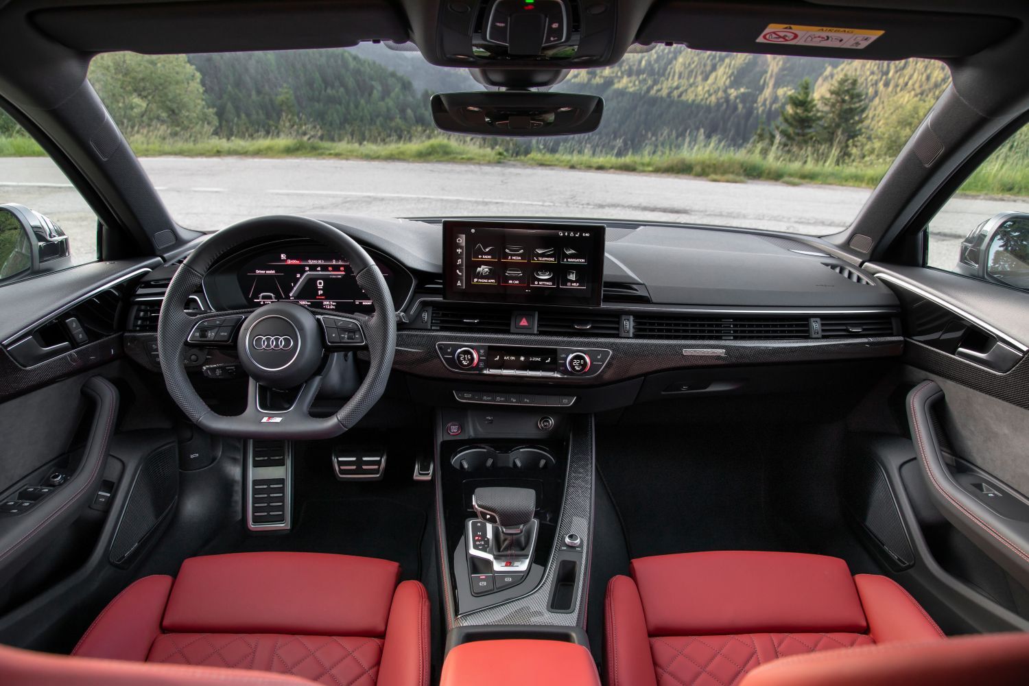 Image of new Audi A4 S4 Avant infotainment system and red leather interior seating