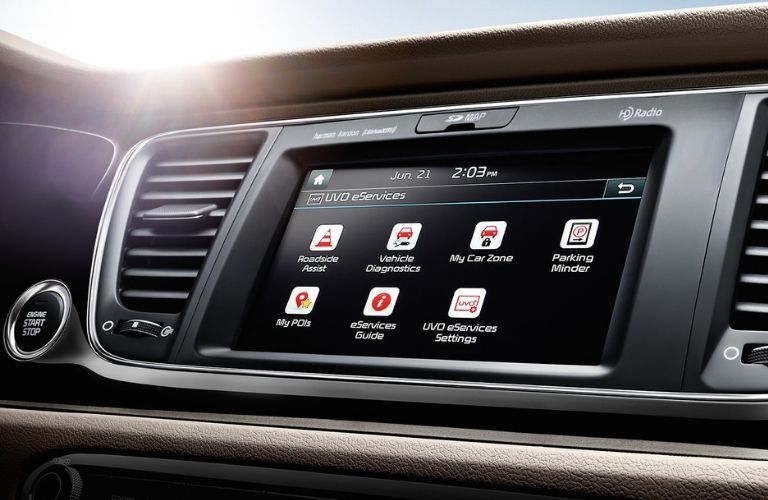 Cropped close up view of a KIA infotainment system featuring UVO