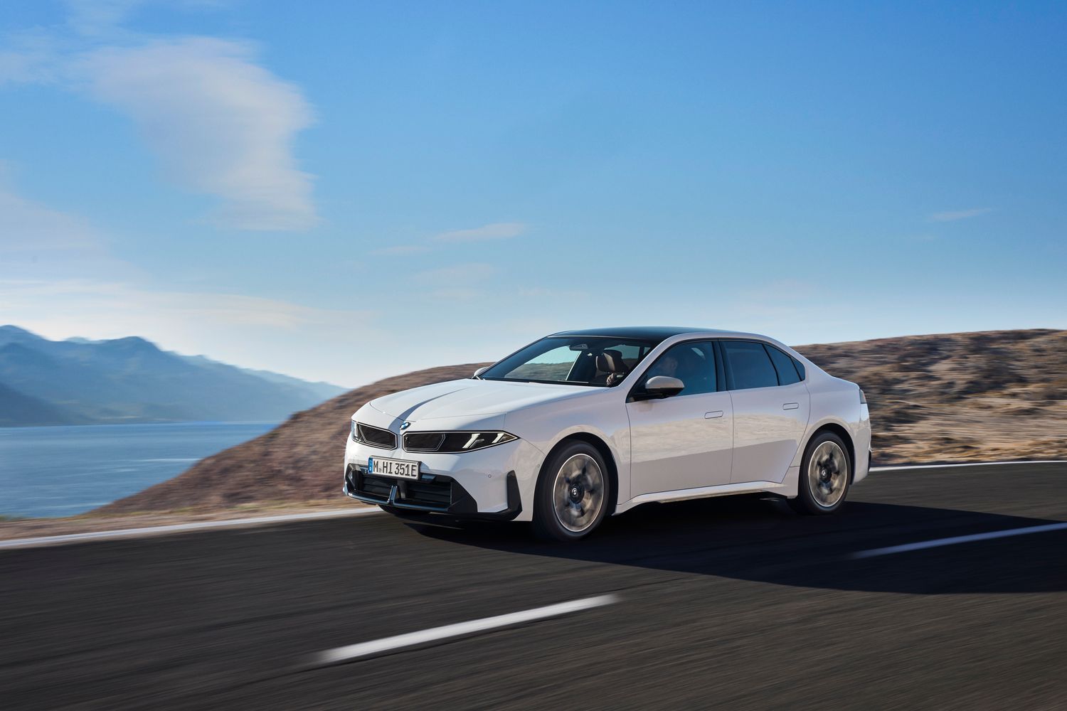 The new BMW i3, driving on road.