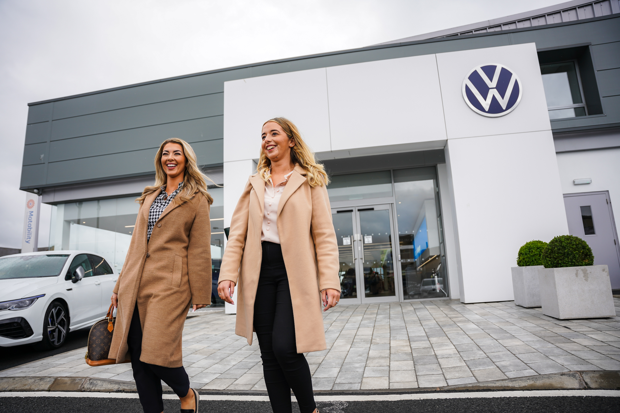 Customers leave Agnew Volkswagen Belfast after getting LifeShine applied to car