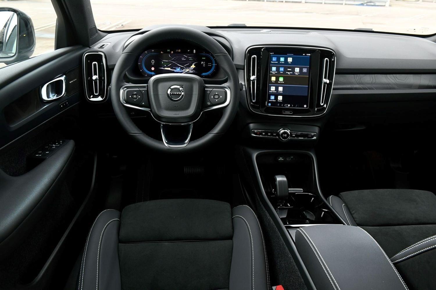Close-up of the steering wheel and infotainment system in the Volvo C40 Recharge