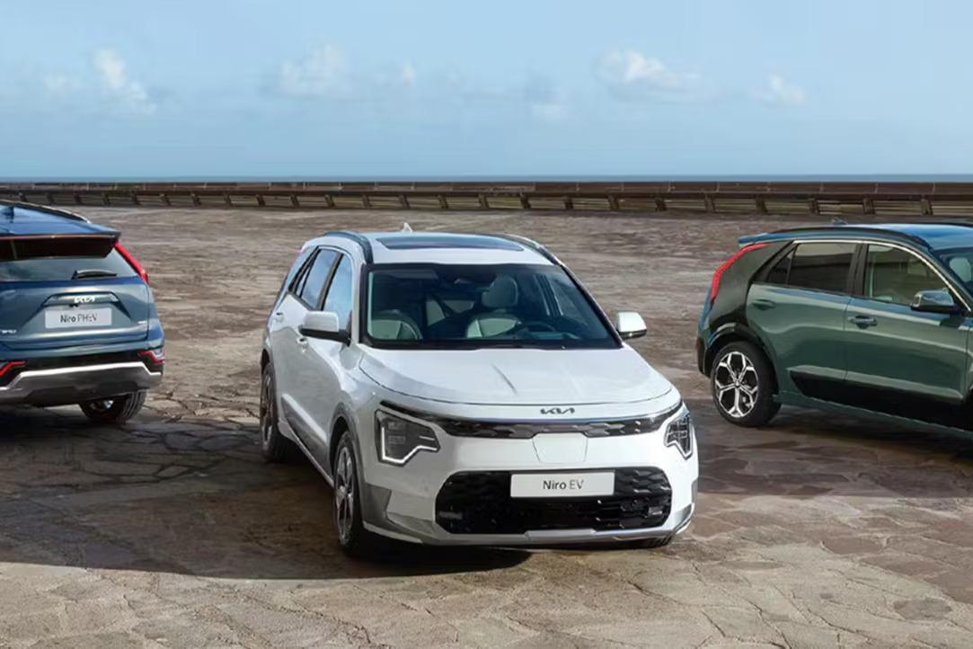 Three Kia Vehicles