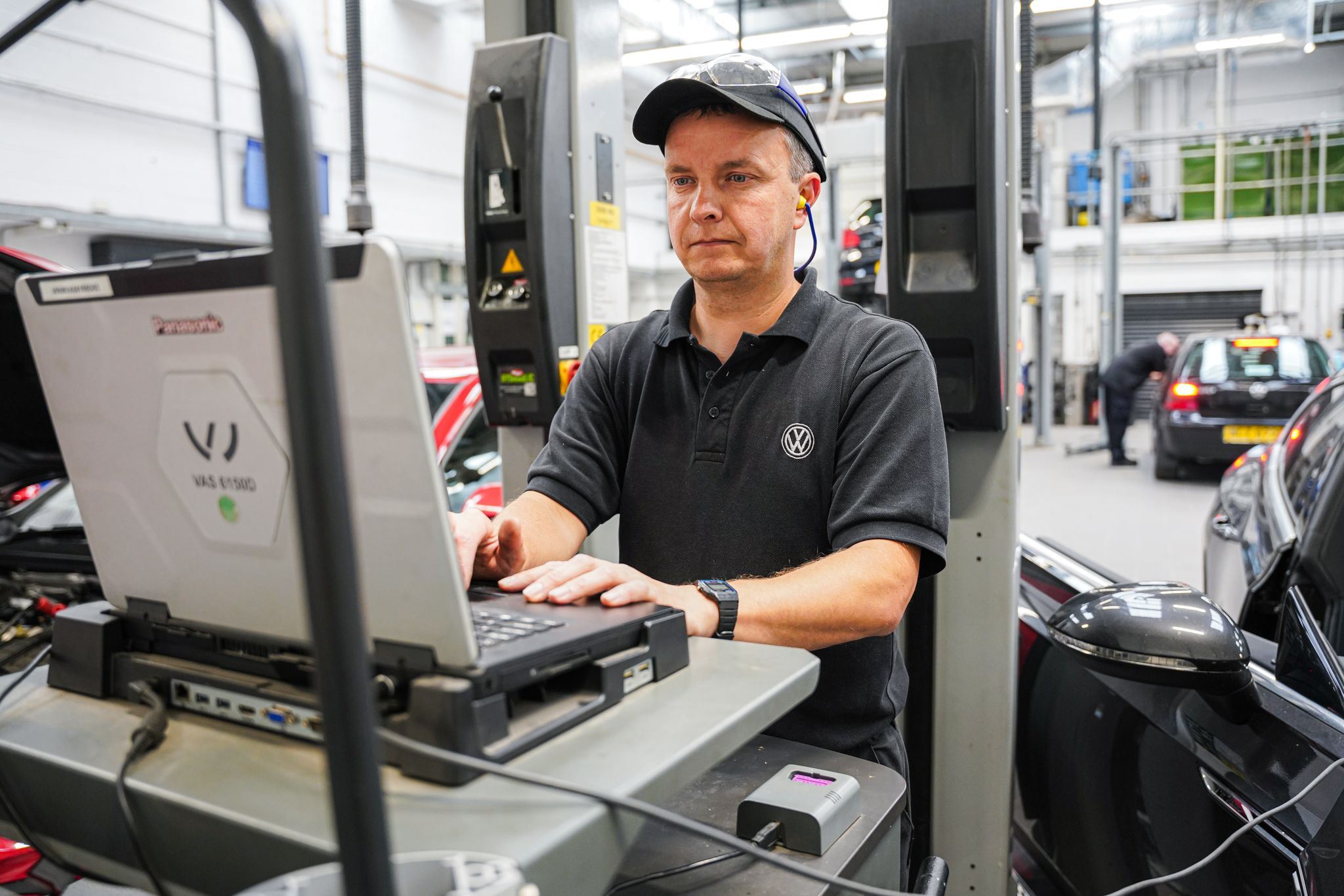 Volkswagen Service Specialists inspects the electrics of a Volkswagen Arteon during pre-MOT inspection at the Volkswagen Approved Accident Repair Centre, Agnew Volkswagen Belfast