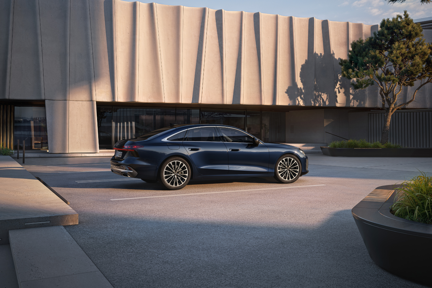 New Audi A6 Saloon, available at Belfast and Portadown Audi, in black parked in driveway