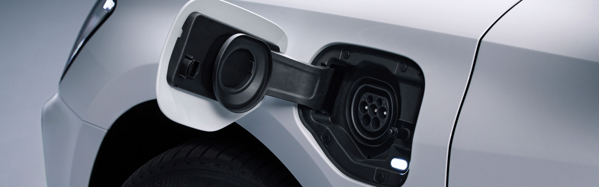 Close-up of a plug-in hybrid vehicles charging port
