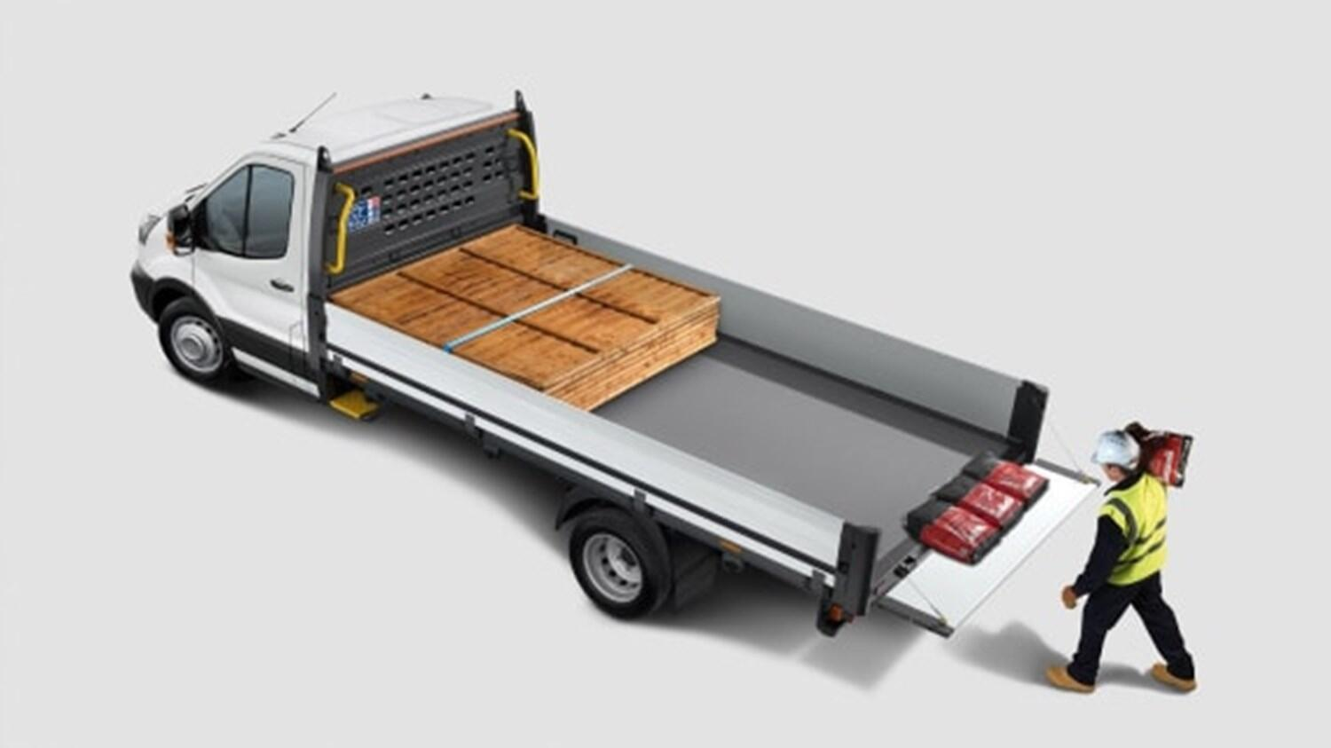 Construction worker loading materials onto Ford Transit One Stop Shop