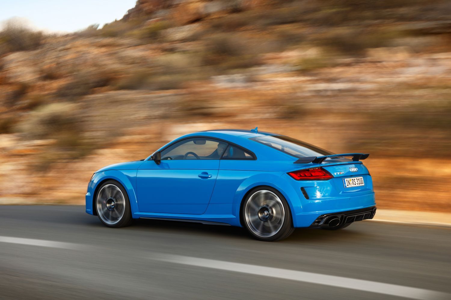 New Audi TT RS Coupe in blue image of vehicle driving