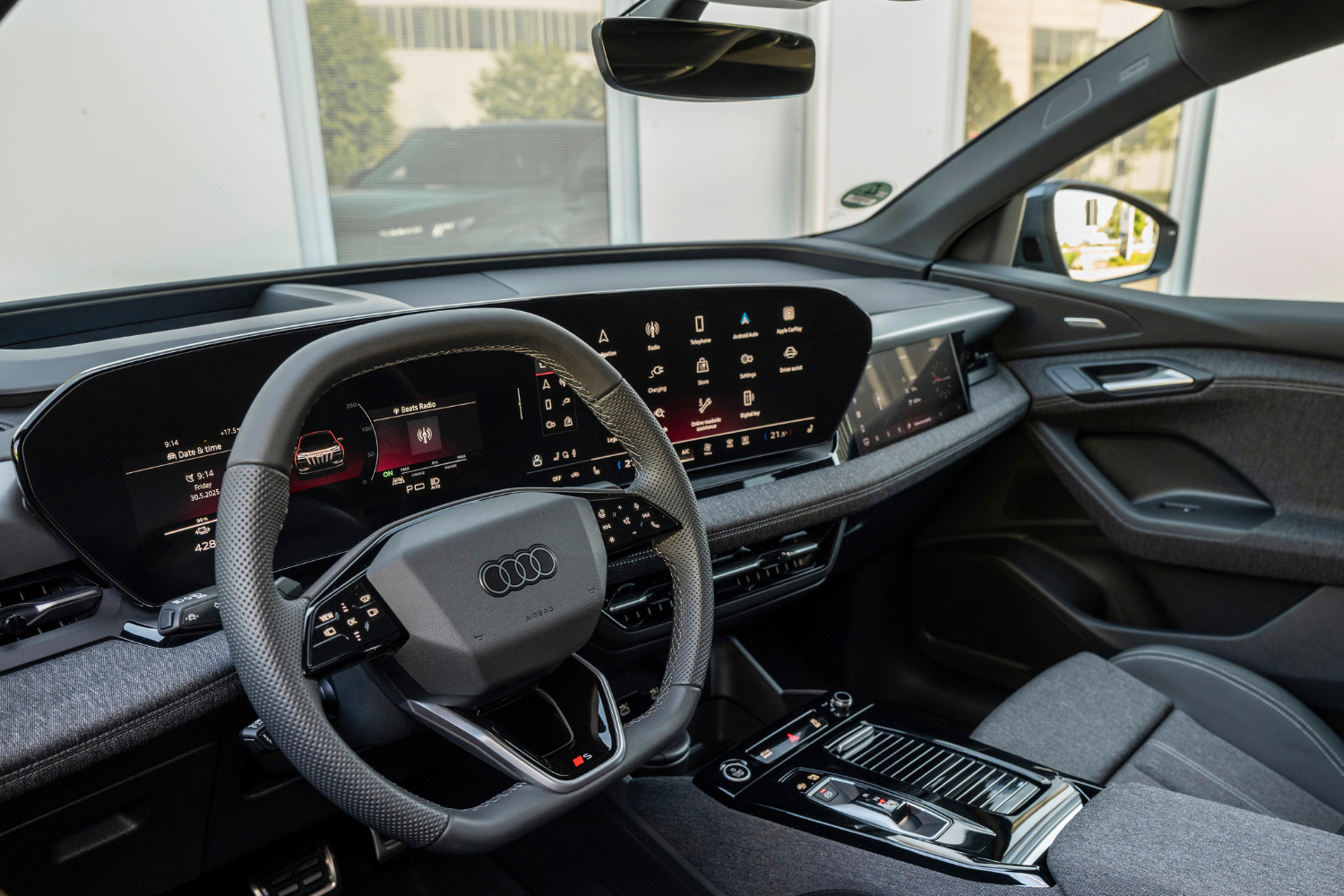 Close up view of driver displays in the new Audi Q6 Sportback e-tron.