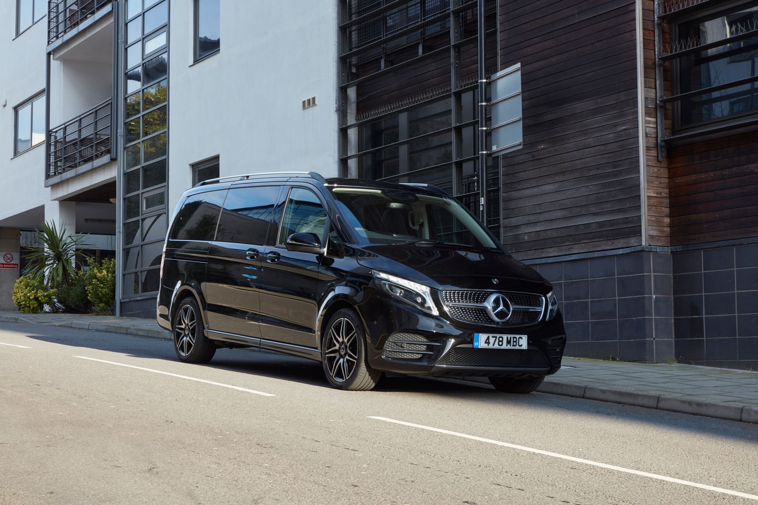 Side view of a parked black Mercedes-Benz V-Class.