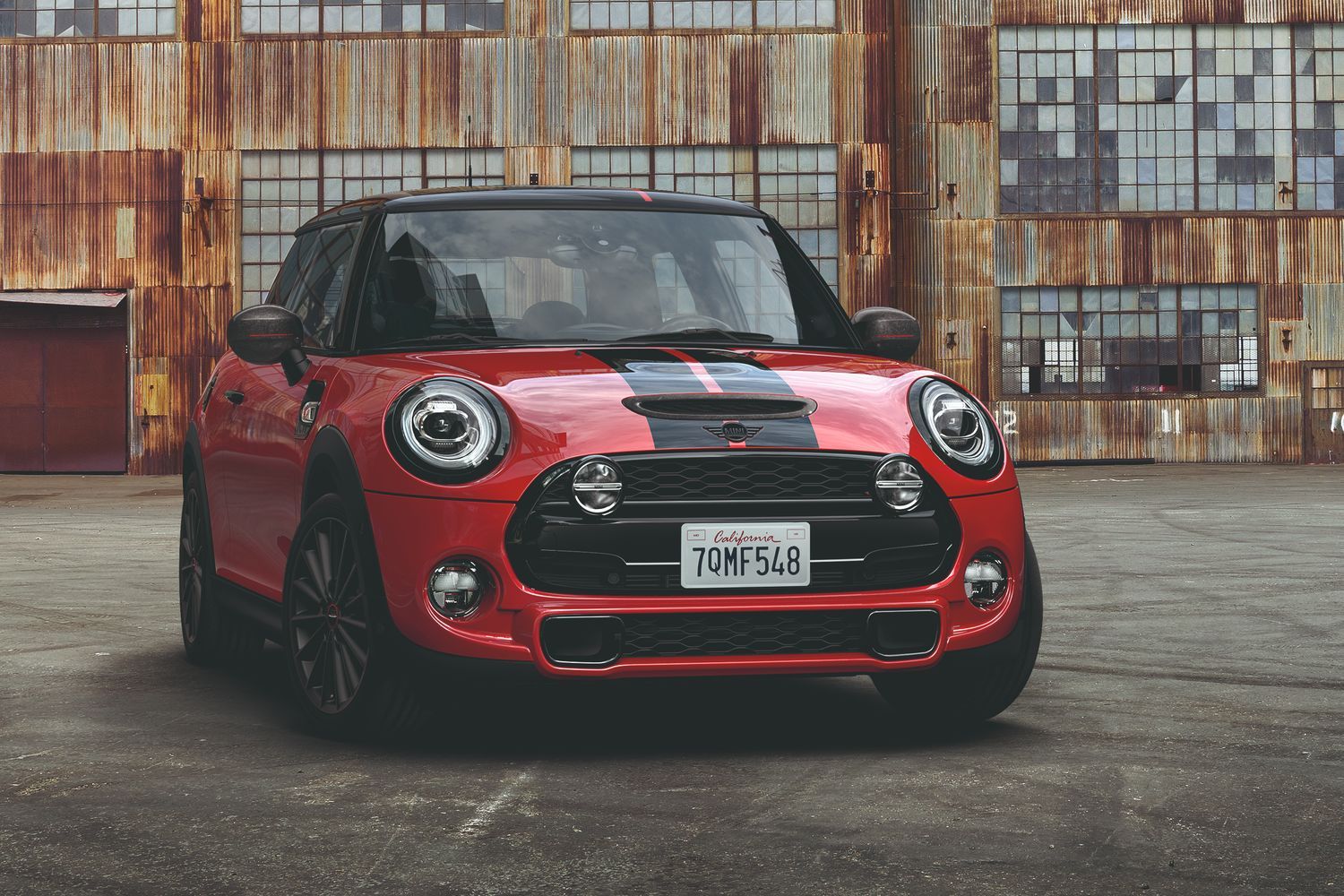 MINI John Cooper Works in red, parked in industrial park