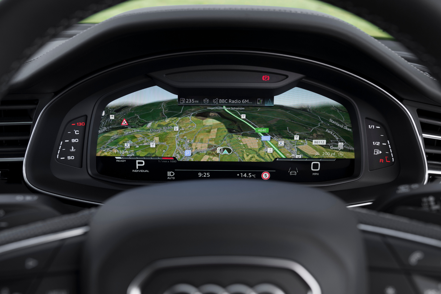 Close-up of the Audi A7 central console display in front of steering wheel