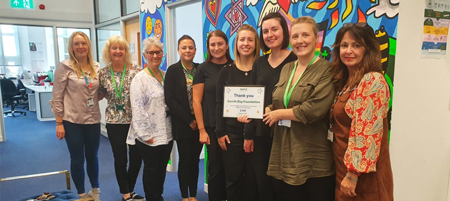 Group of ladies accepting the Gareth Day Foundation award