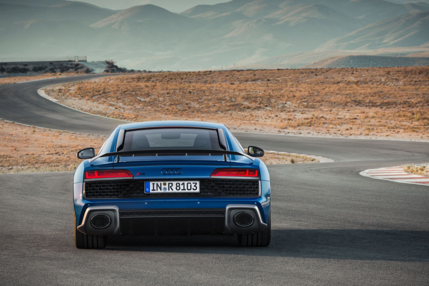 New Audi R8 Coupe in blue, image of vehicle from behind