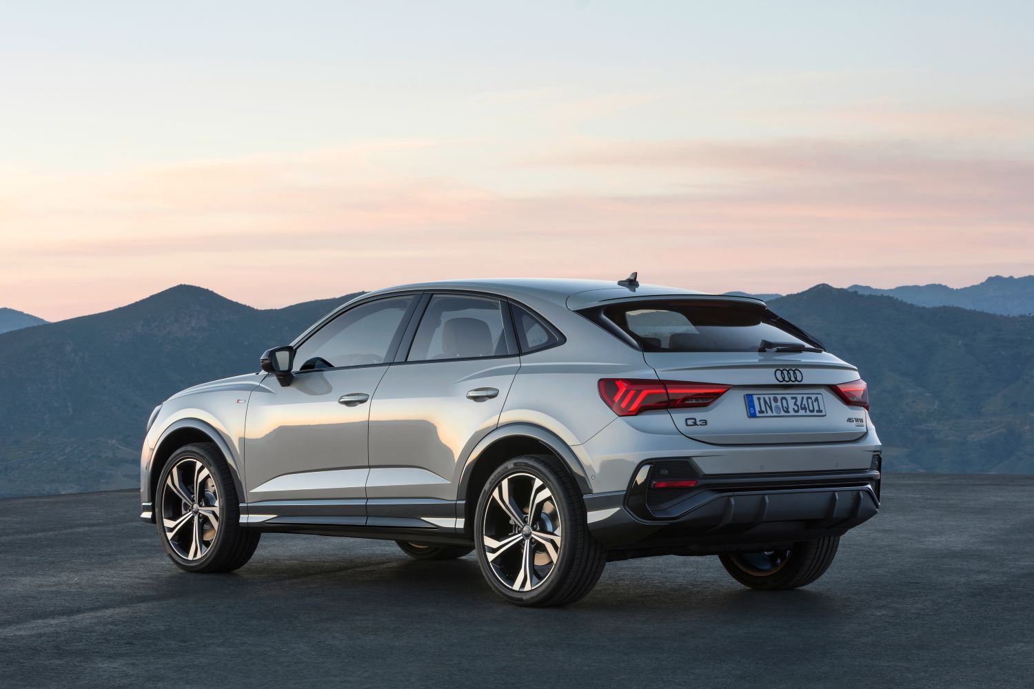 New Audi Q3 Sportback in silver side view of vehicle from behind