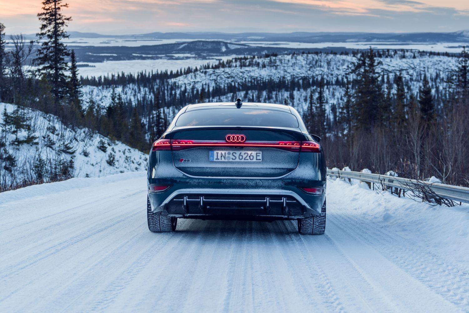 Audi S5 driving carefully down a hill