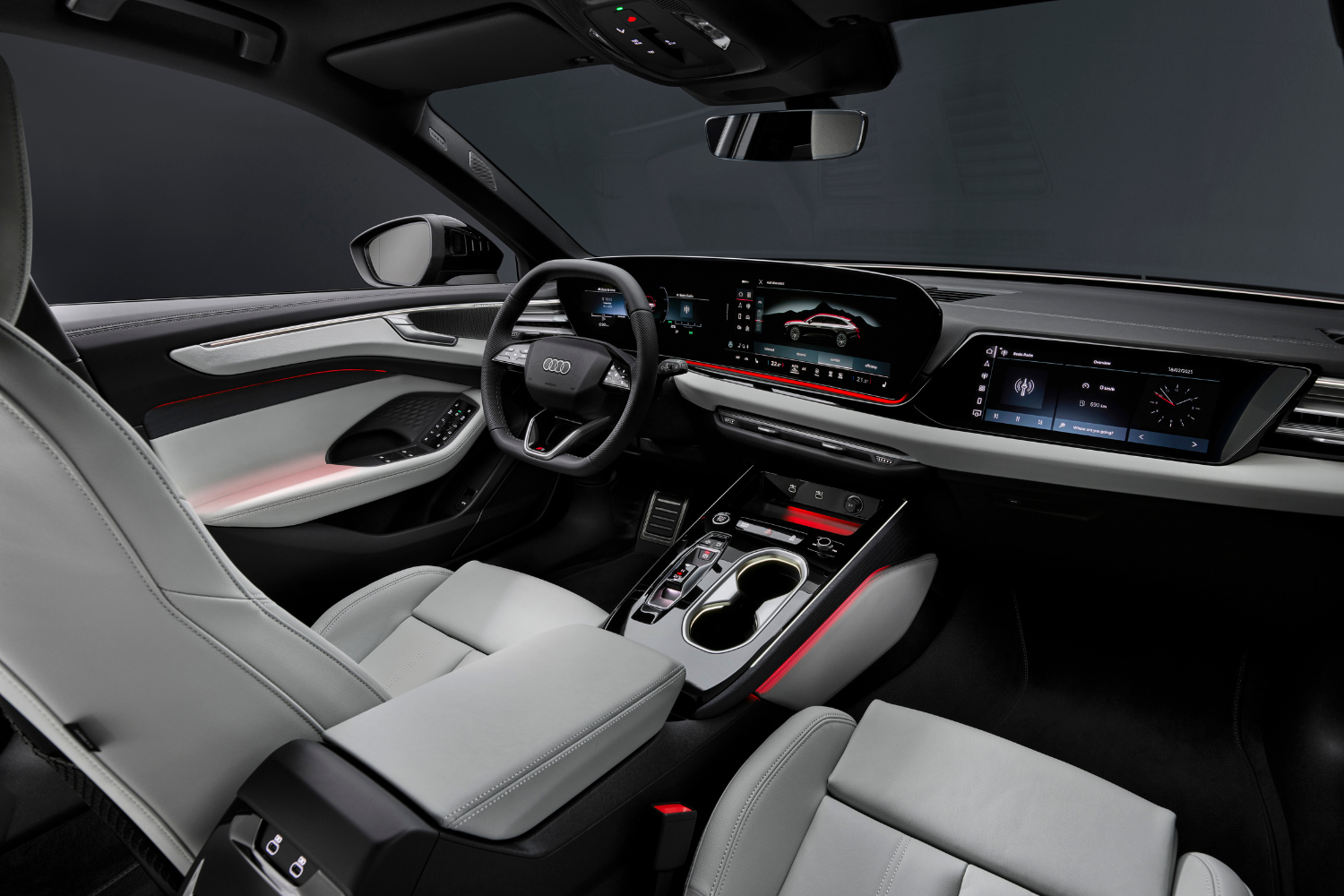 2025 Audi A6 Avant's cream and black interior with red LED lights.