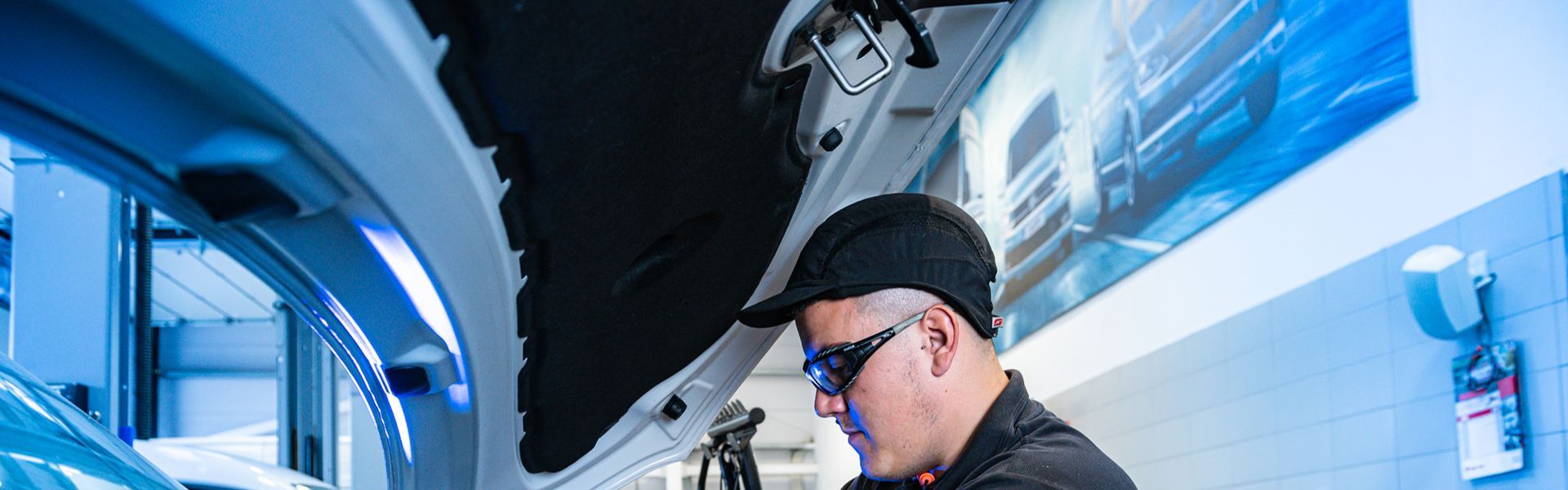 Volkswagen Service Specialist makes under the hood repairs to Volkswagen Commercial Vehicle at Volkswagen Approved Repair Centre at Agnew Van Centre, Mallusk