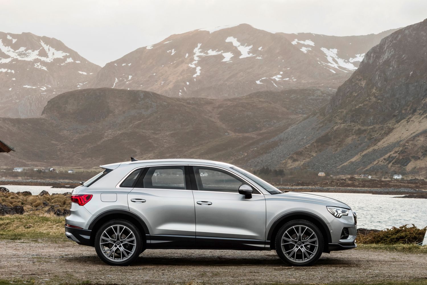 New Audi Q3 in silver parked side view
