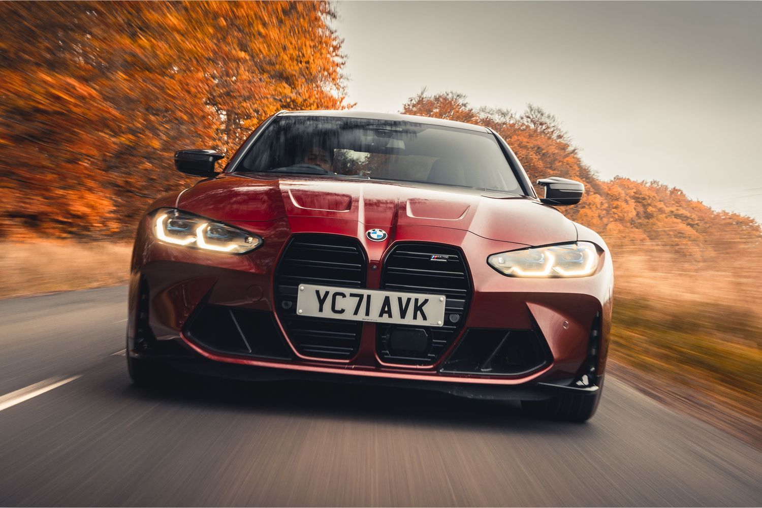 New BMW M3 Competition front exterior view of the vehicle driving