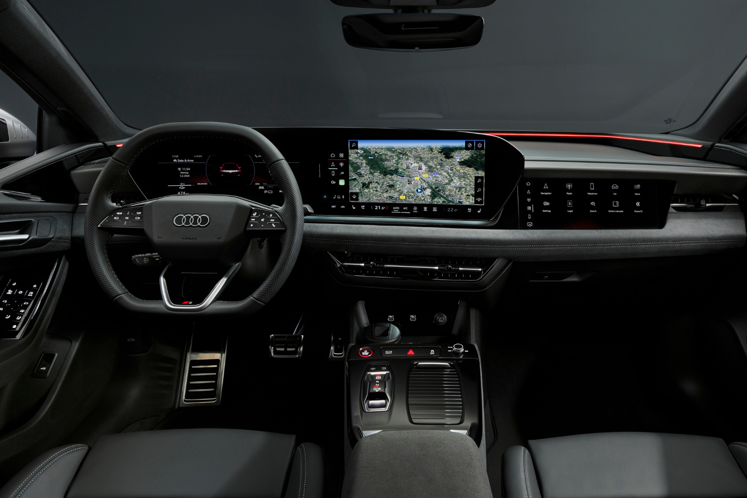 Audi S6 Sportback e-tron black leather interior, driver display and steering wheel.