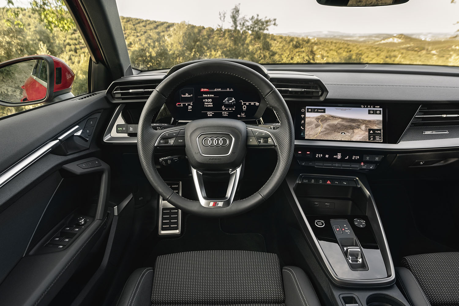 New Audi A3 Sportback interior displayed, shown is the digital cockpit and larger infotainment screen.