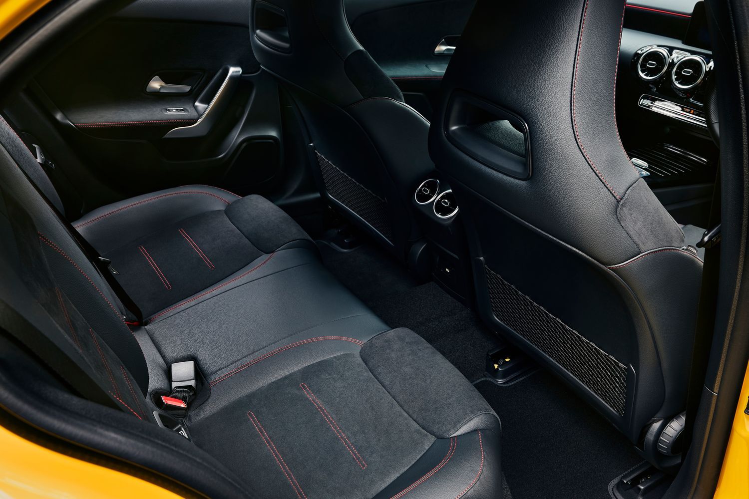 Mercedes-Benz A-Class Hatchback black interior rear seats with red stitching.